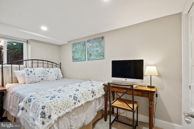 bedroom with recessed lighting and baseboards