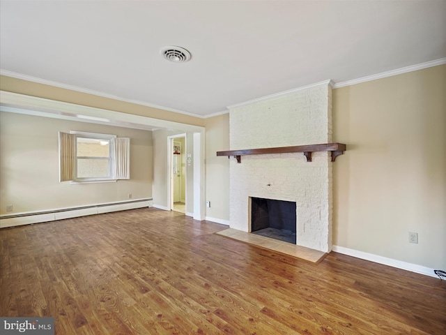 unfurnished living room featuring crown molding, a baseboard heating unit, hardwood / wood-style floors, and a large fireplace