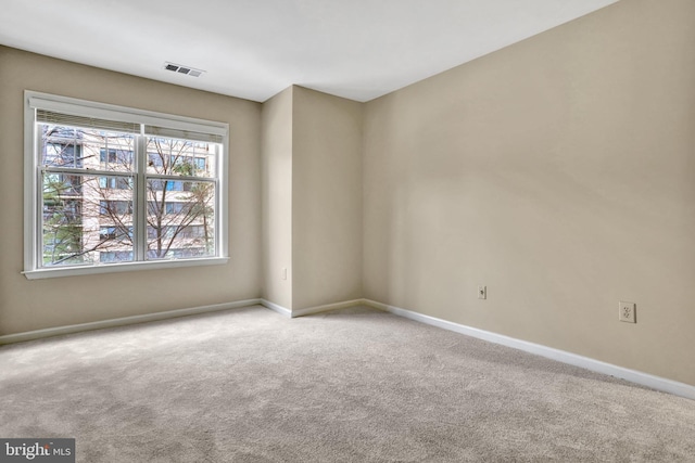 view of carpeted spare room