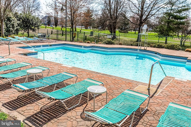 view of swimming pool featuring a patio