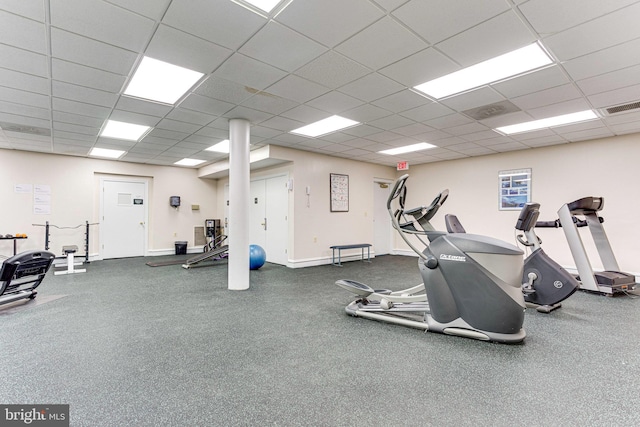 gym featuring a paneled ceiling