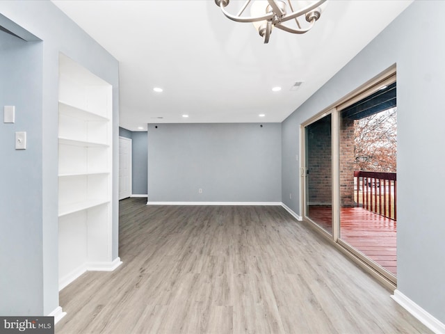 unfurnished living room featuring light hardwood / wood-style floors