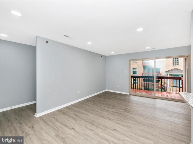 interior space with hardwood / wood-style flooring