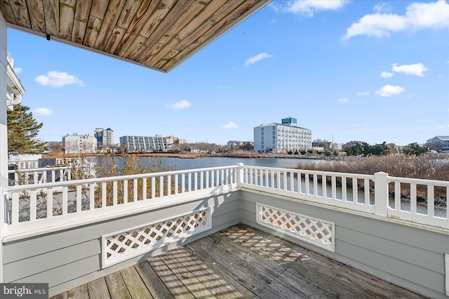 wooden terrace with a water view