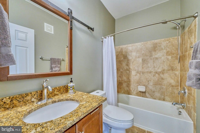 full bathroom with vanity, toilet, and shower / bath combo