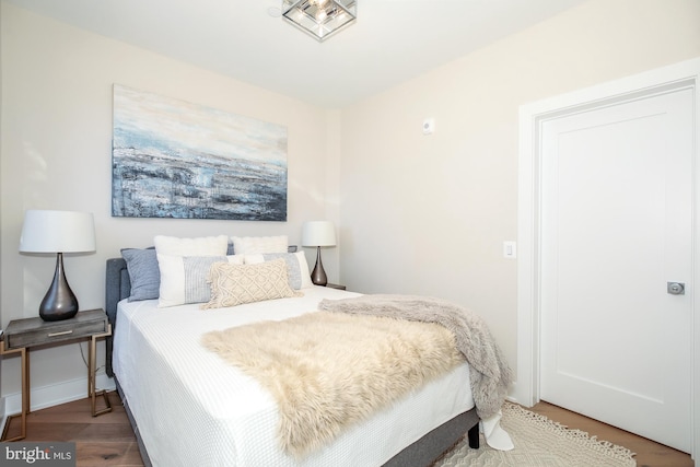 bedroom featuring hardwood / wood-style flooring