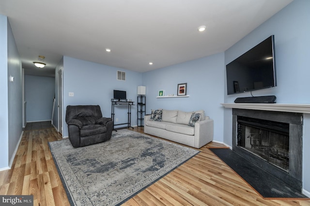 living room with hardwood / wood-style floors