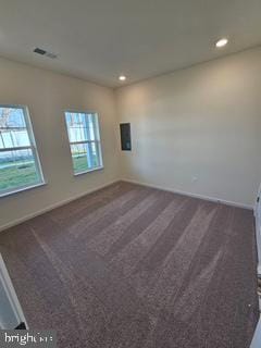 view of carpeted spare room