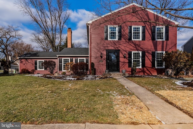 view of front of home with a front yard