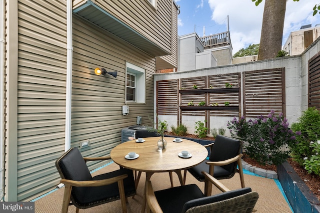 view of patio featuring cooling unit