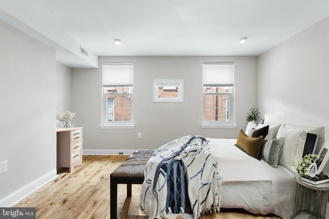 bedroom featuring light hardwood / wood-style flooring