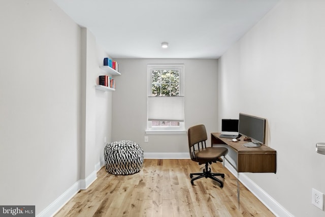 home office featuring light hardwood / wood-style flooring