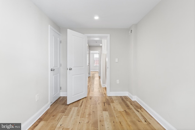 corridor featuring light wood-type flooring