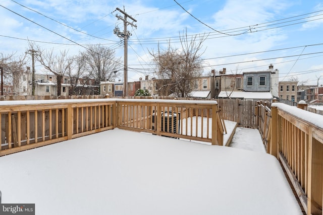 view of snow covered deck