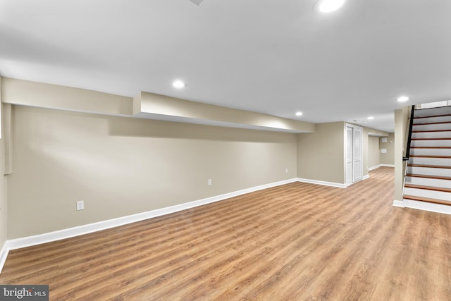 basement with light wood-type flooring