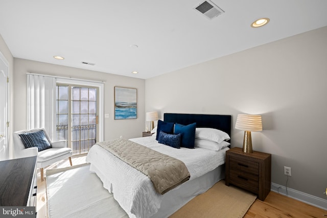 bedroom featuring light wood-type flooring