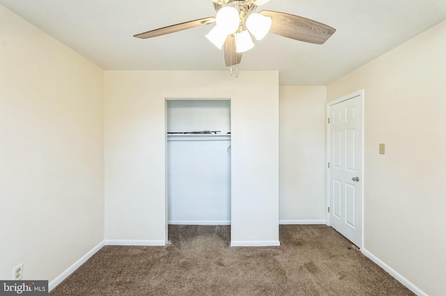 unfurnished bedroom featuring ceiling fan, carpet flooring, and a closet