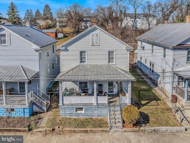 back of house featuring covered porch