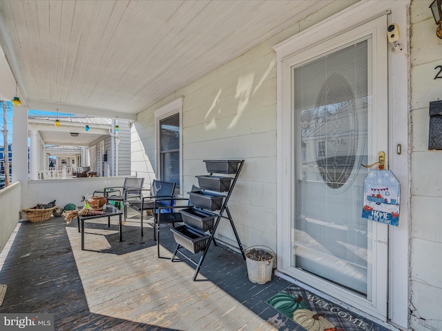 deck with covered porch