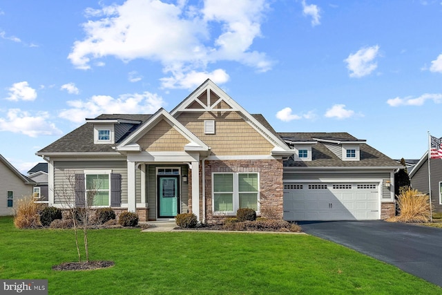 craftsman-style home featuring a front yard