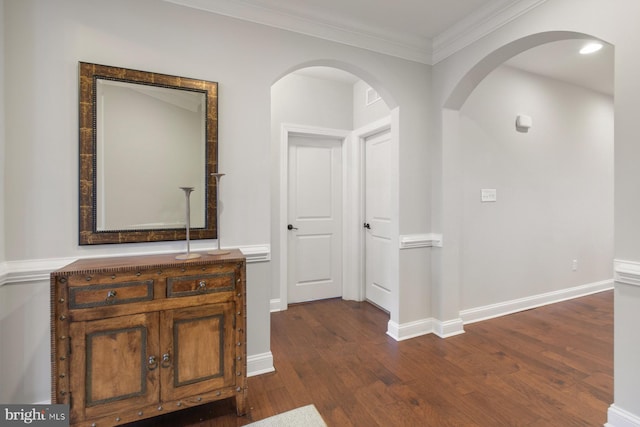 corridor featuring crown molding and dark hardwood / wood-style floors