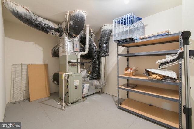 utility room with heating unit