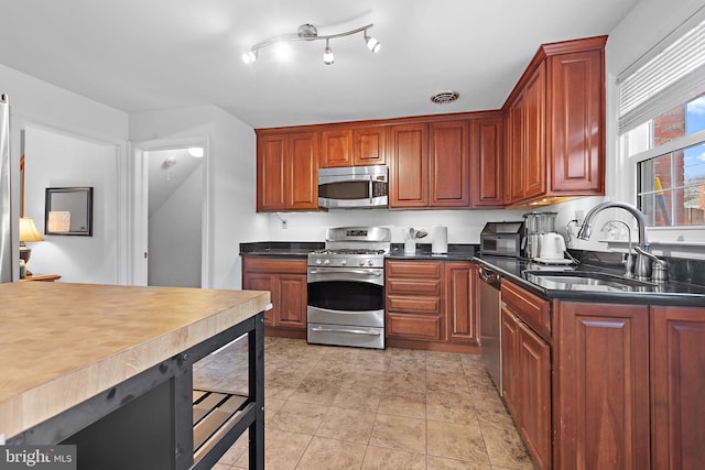 kitchen featuring sink and stainless steel appliances