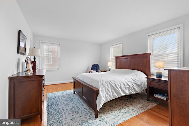 bedroom featuring light hardwood / wood-style floors