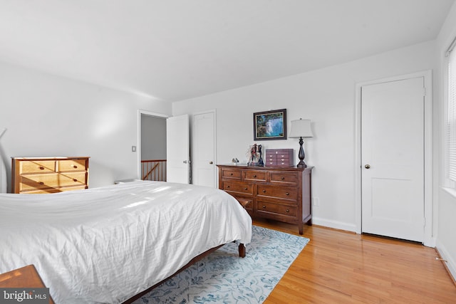 bedroom with wood-type flooring