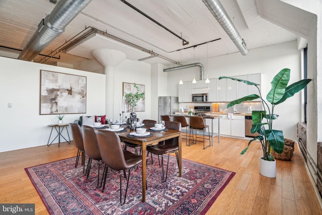 dining area featuring light hardwood / wood-style floors