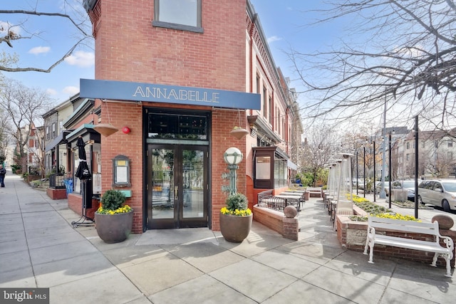 entrance to property featuring french doors