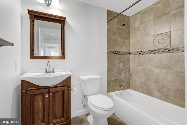 bathroom with toilet, a textured ceiling, baseboards, bathing tub / shower combination, and vanity