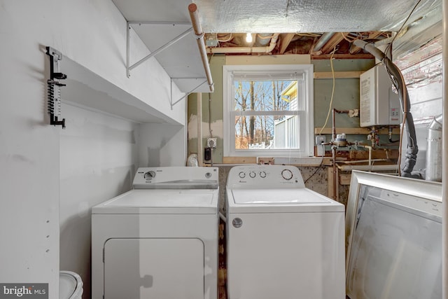 laundry room featuring laundry area and separate washer and dryer