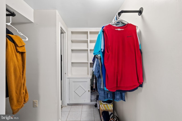 spacious closet with tile patterned flooring