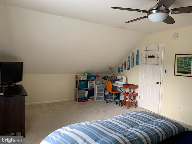 carpeted bedroom with lofted ceiling, baseboards, and a ceiling fan