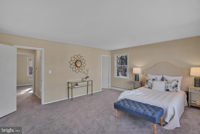 bedroom with light carpet and baseboard heating