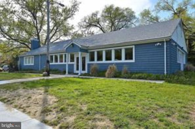 1165 Green Holly Ct, Annapolis, MD 21409 - single story home with a front yard and a chimney