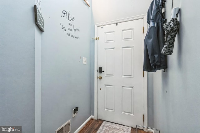 doorway featuring dark hardwood / wood-style flooring