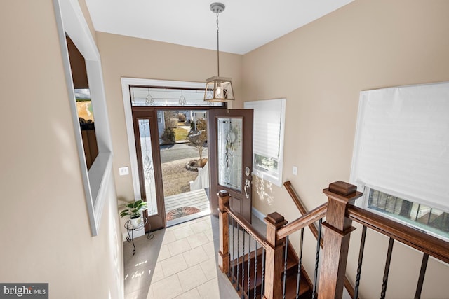 view of tiled foyer entrance