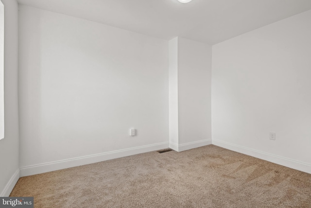 view of carpeted spare room