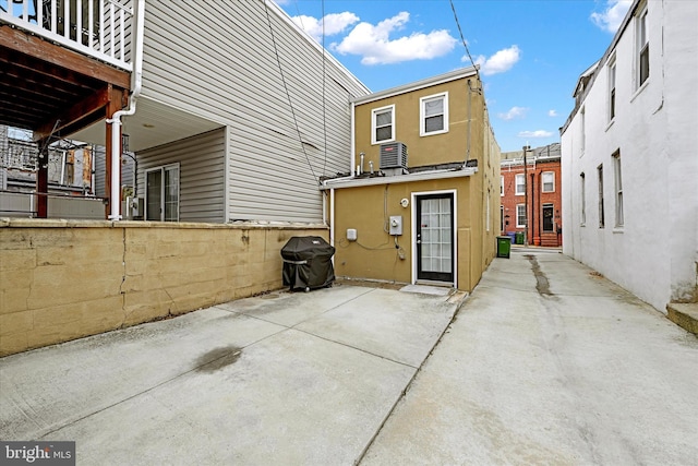 back of house with a patio area