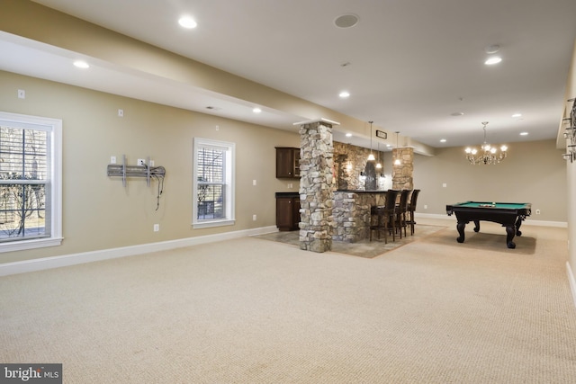 rec room featuring light colored carpet, bar area, and billiards