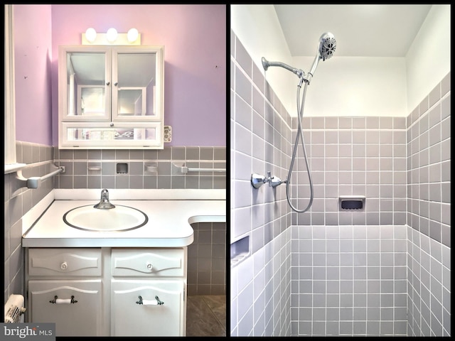 bathroom featuring vanity and tiled shower