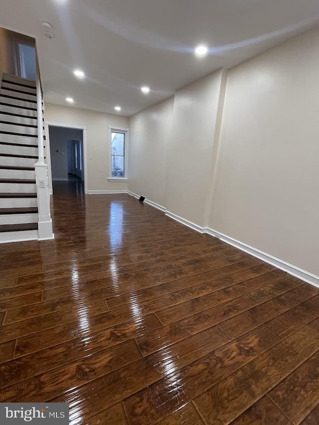 basement with dark wood-type flooring