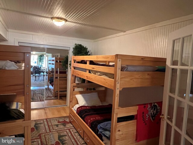 bedroom with wood finished floors