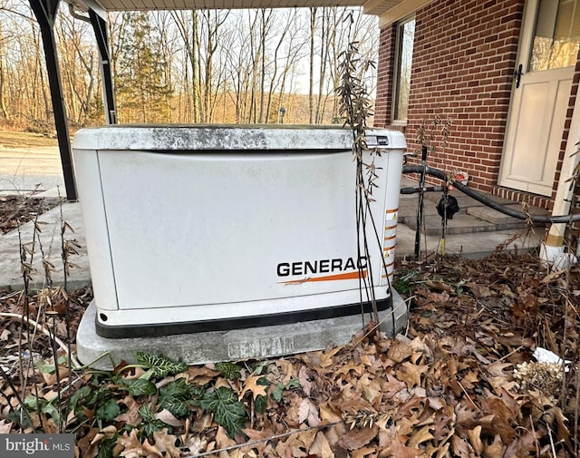 details with brick siding and a power unit