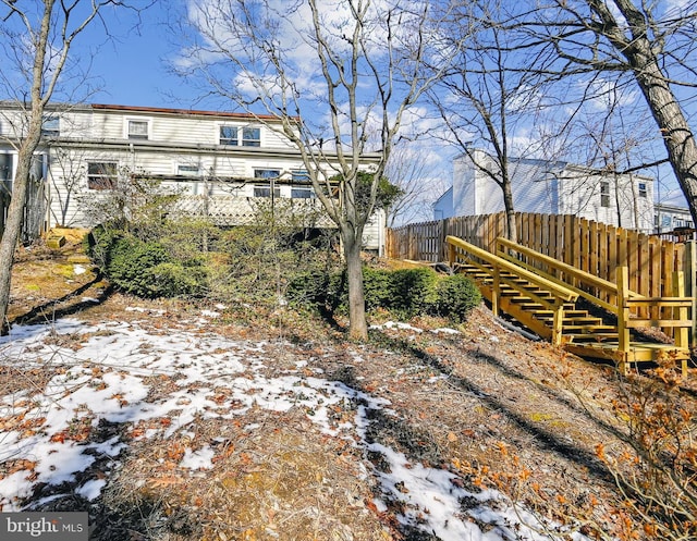 view of yard covered in snow