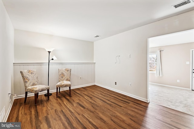 living area with dark wood-type flooring