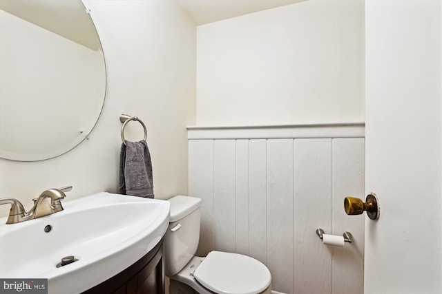 bathroom with sink and toilet