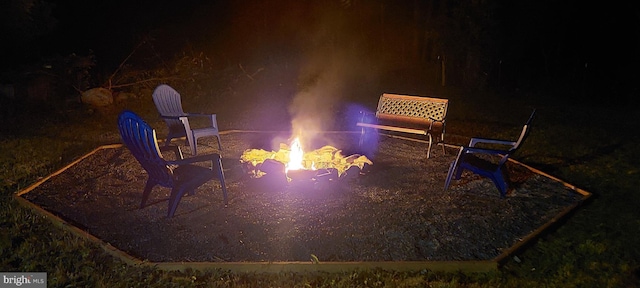 view of property's community with a fire pit